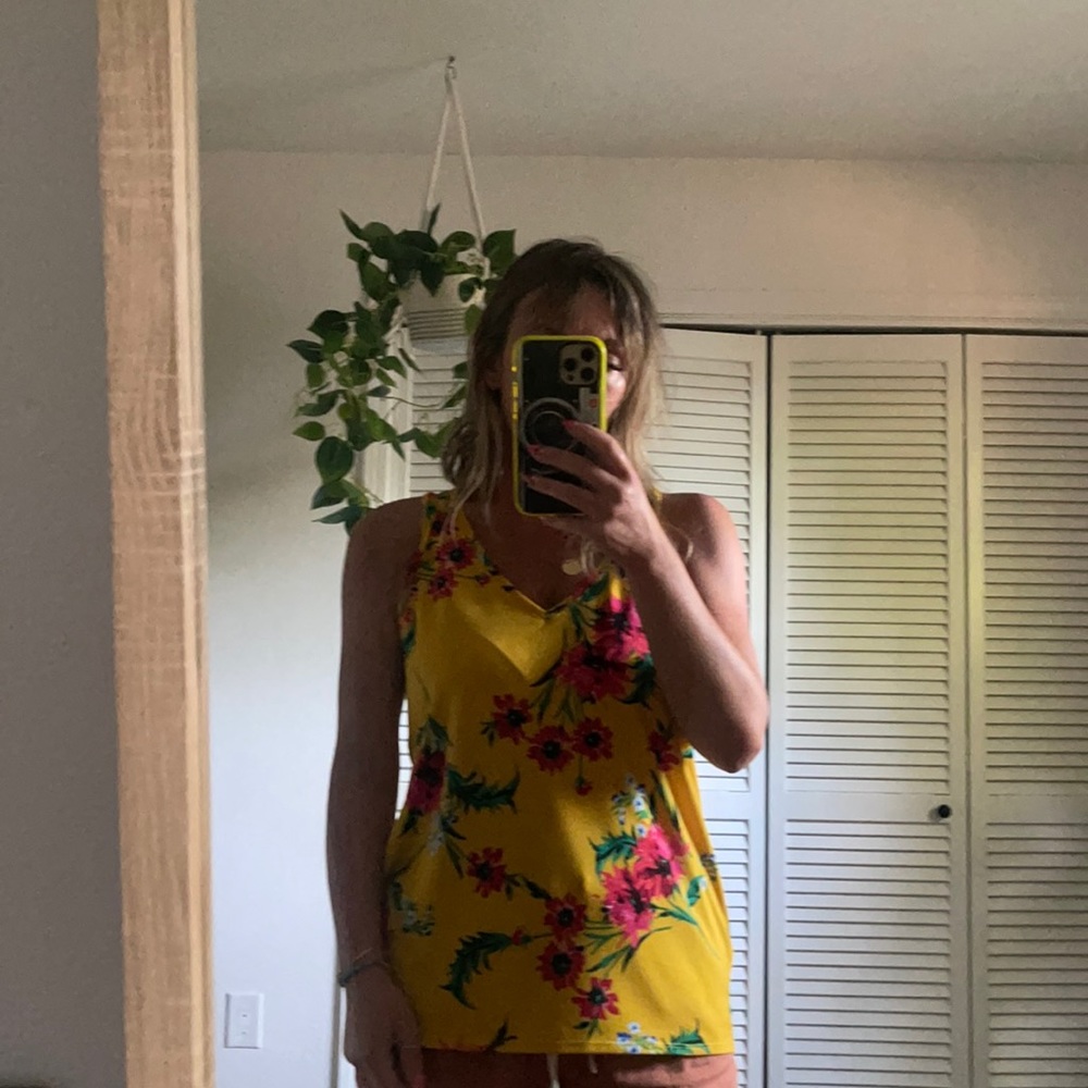 Yellow sleeveless blouse